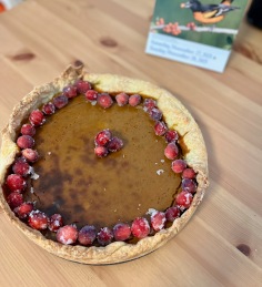 Pumpkin pie with candied cranberries